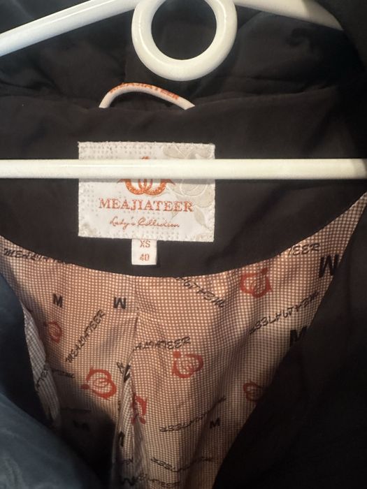 Пуховик нв дівчину