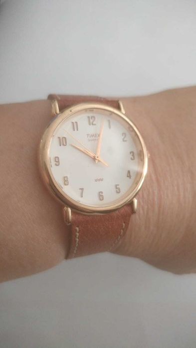 Timex, em estado novo, dourado