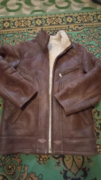 ДУБЛЁНКА .Размер 52.Очень лёгкая.