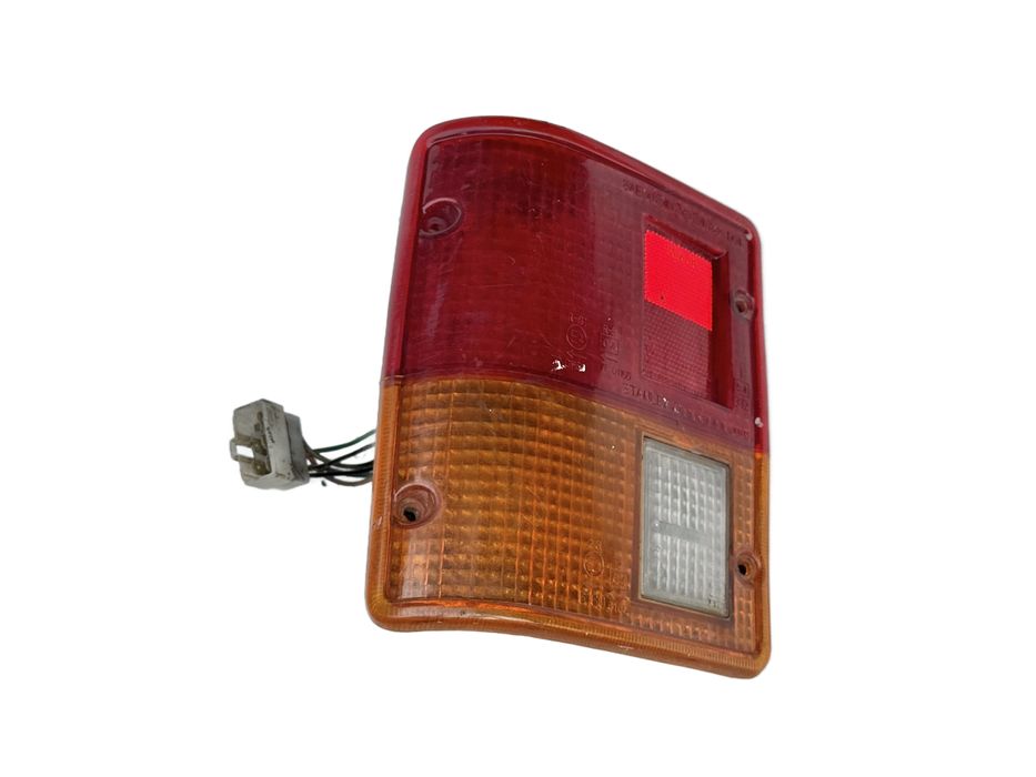 Lampa tylna lewa Mitsubishi Pajero 1 L200 0436772L NOWE