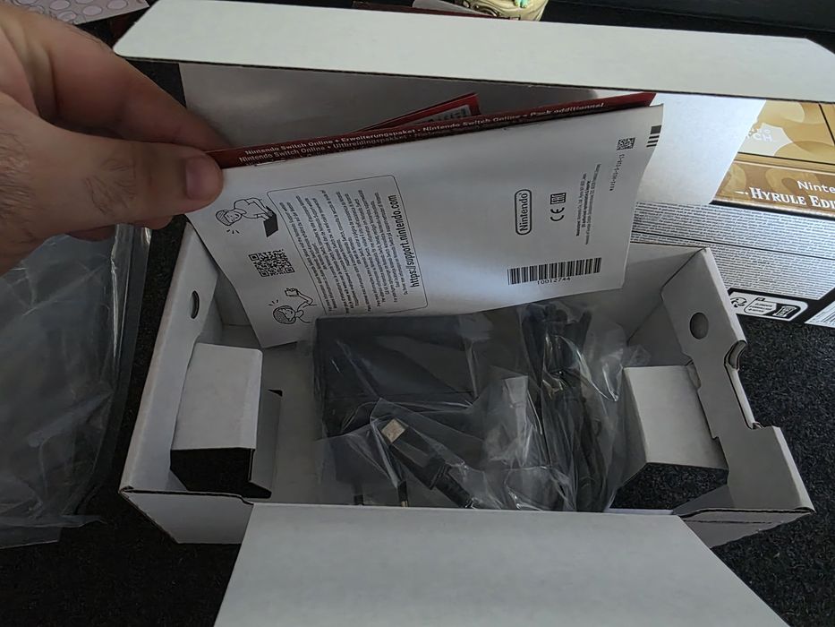 Nintendo Switch Lite - Hyrule Edition (Never Used)64729616262531124