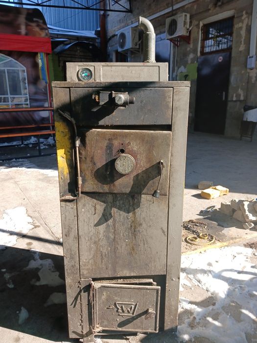 Котел твердопаливний КСТ