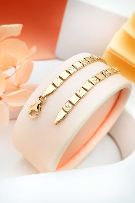 Złota segmentowa bransoletka gładkie i diamentowane elementy 18cm 585