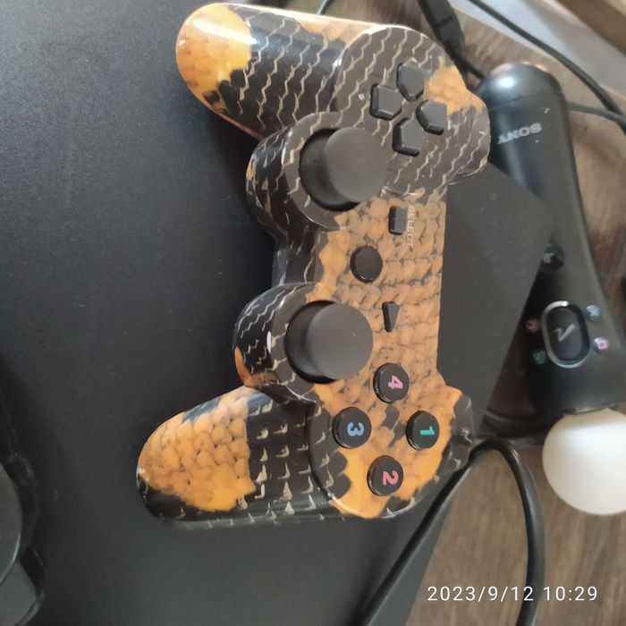 Ps3, dwa pady, kontroler move, kamera. 14 gier