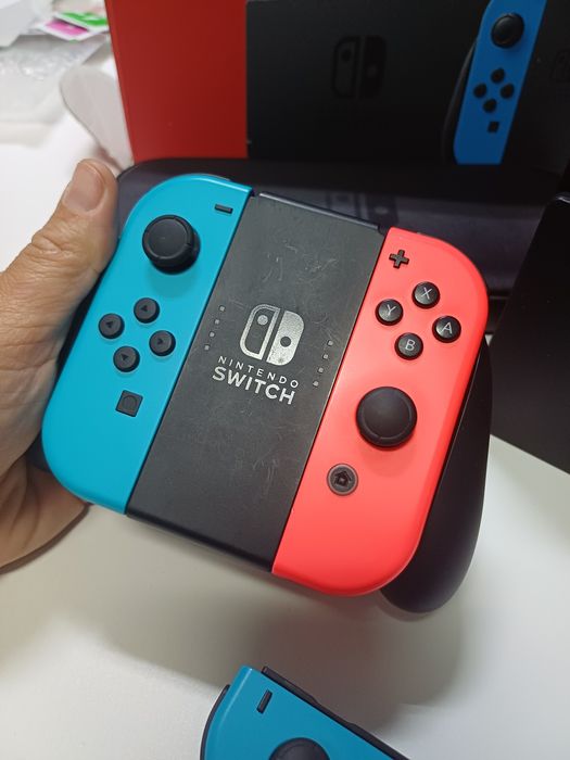 Nintendo + comando extra + bolsa