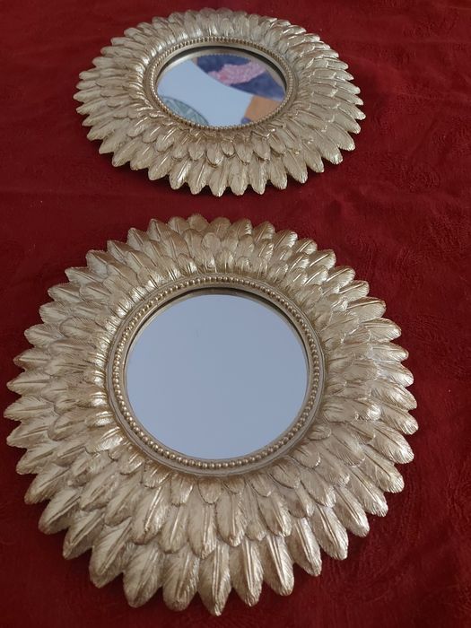 Dois espelhos dourados da Sfera