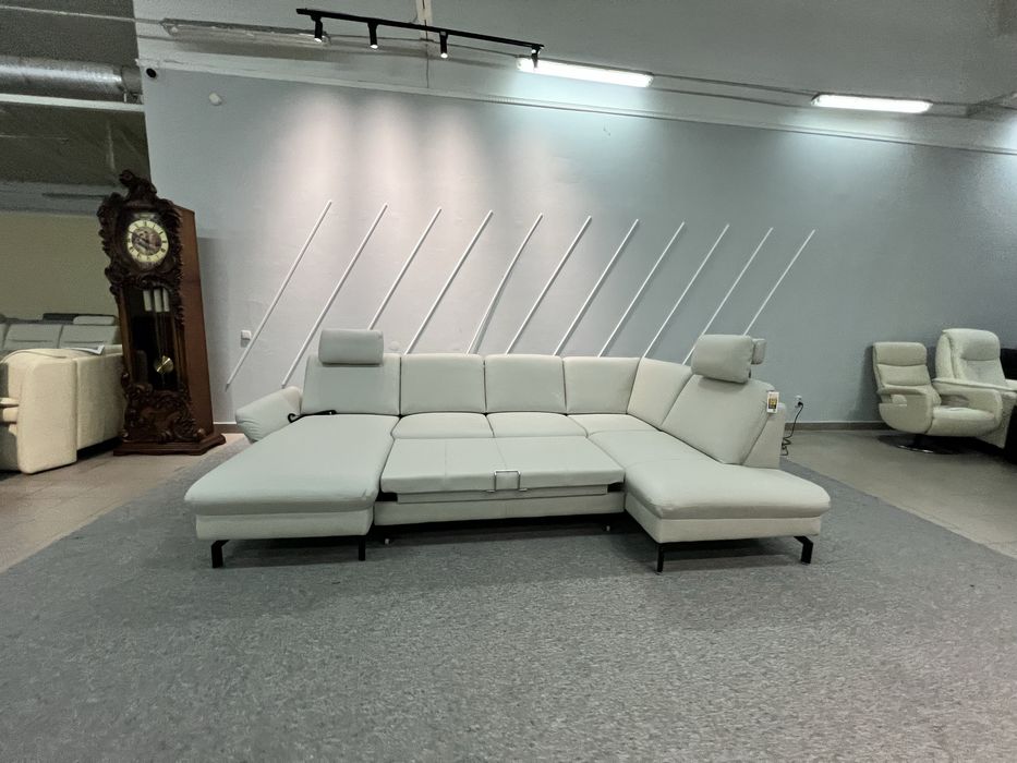 Виставковий новий шкіряний розкладний диван реклайнер