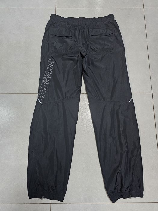 Nike Sportswear spodnie do biegania roz.M wodoodporne