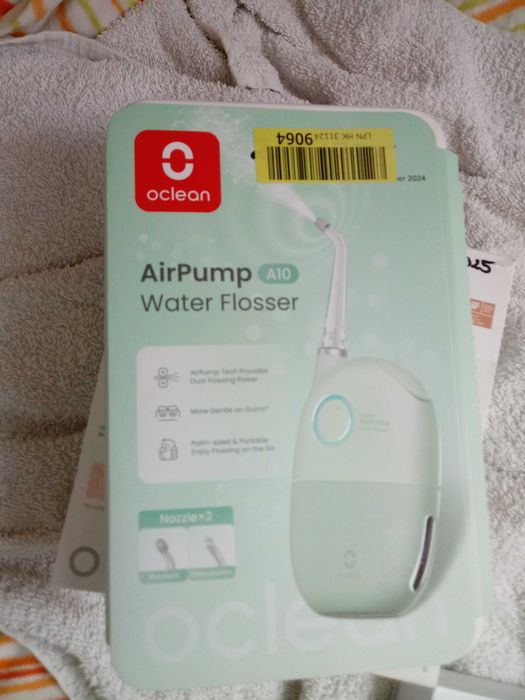 Szczoteczka OCLEAN X PRO koloru niebieskiego+irygator OCLEAN