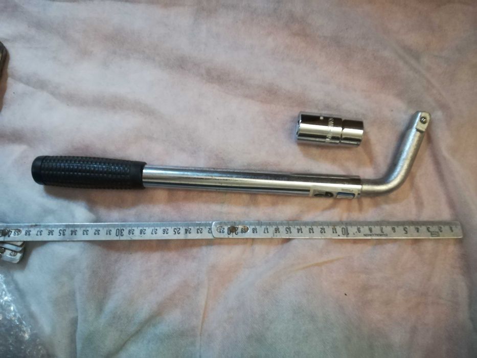 chave de roda extensivel com 2 soquetes 17 a 23 mm