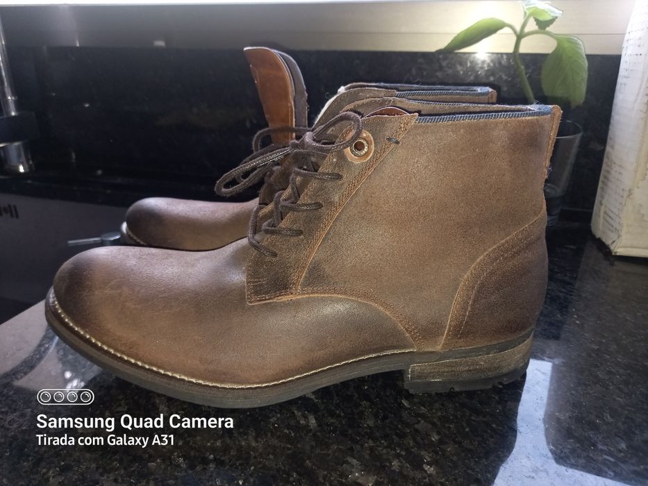 Botas de homem da salsa