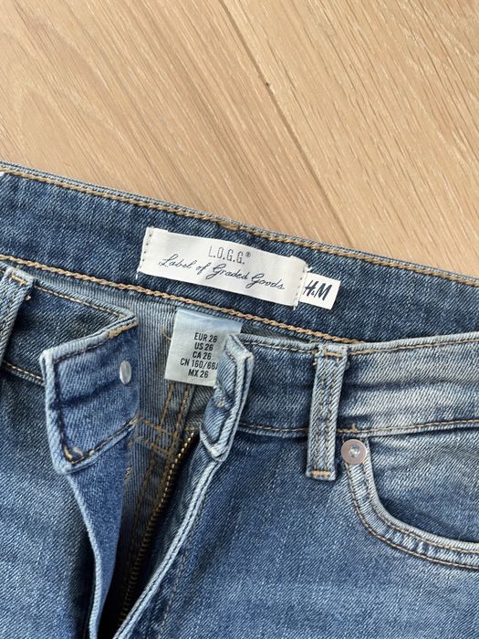Jeansy H&M ze srebrnym lampasem rozmiar 26