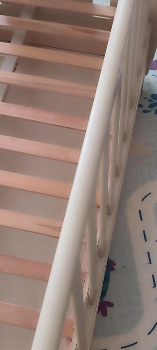 Дитяче ліжечко з маятником