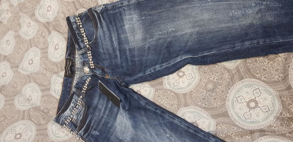 Nowe jeansy rozmiar 25