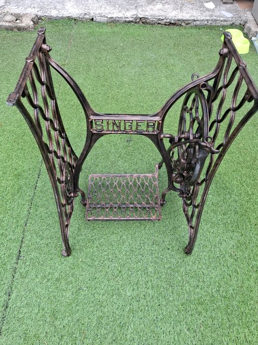 Mesa singer restaurada