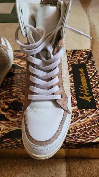 Продам  кожаные сникерсы Hogan