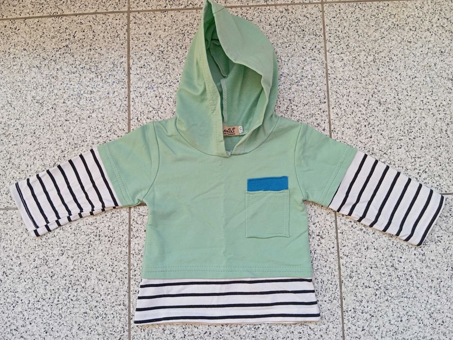 Várias peças bebé babygrows, casacos, sweaters...