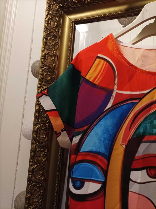 Bluzka wiązana afrykańskie twarze.