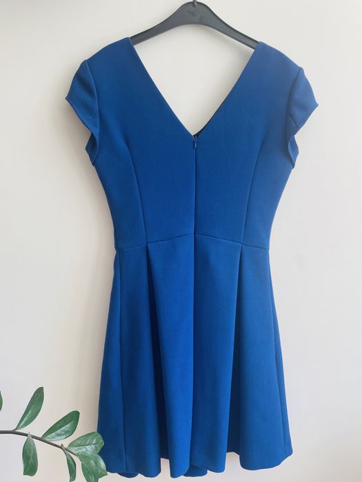 Niebieska elegancka sukienka rozmiar XS szyta na miare