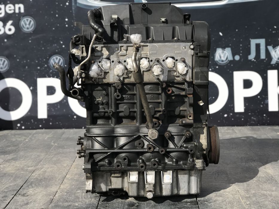 мотор двигатель 1.9 bls 77kw passat b6 golf 5 skoda a5 touran caddy