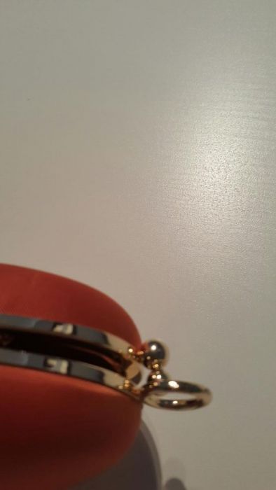 Pochet UTERQUE em forma de ovo nova