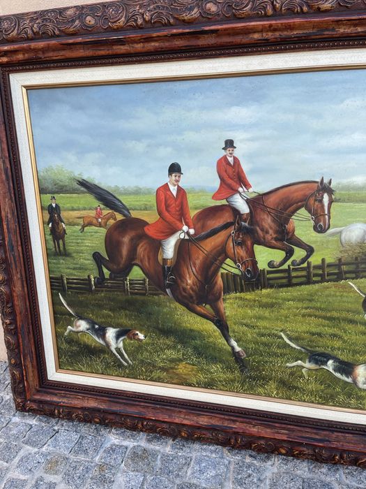 Quadro com pintura de caça com 1,15 de largura e 85 de altura.