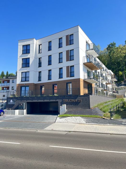 Nowoczesne mieszkanie 46m². 2 pokoje. Centrum. Pierwszy najem. Garaż podziemny.