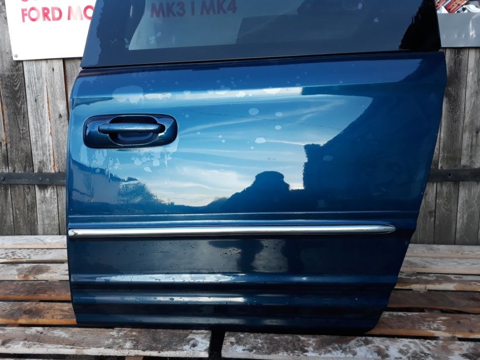 Drzwi lewy tył voyager IV 06r granat