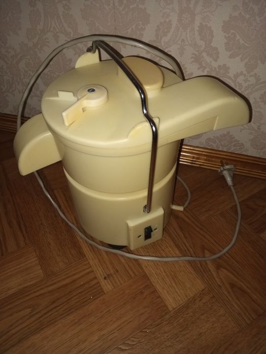 Соковыжималка електрическая