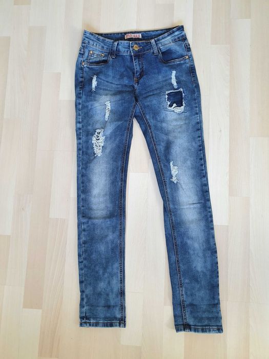 Jeansy damskie rozm. 36/38,  jak NOWE