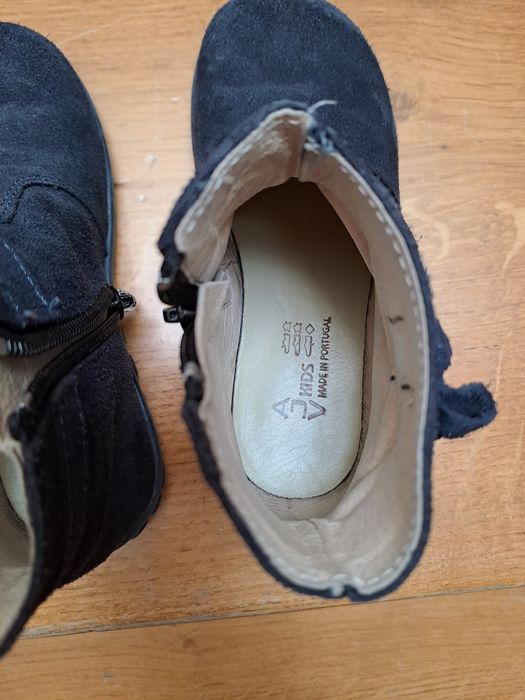 Botas em pele por dentro