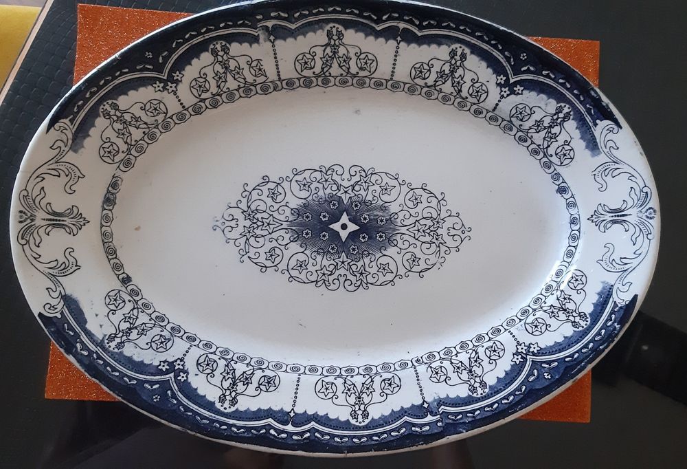 White oval tray with blue motifs