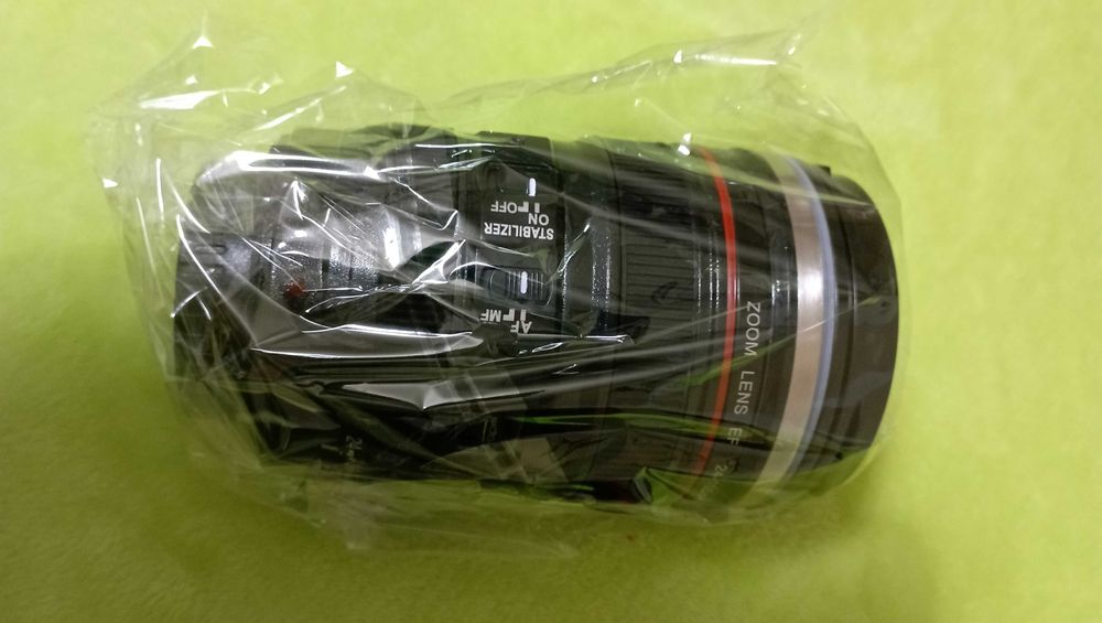 Caneca em forma de lente fotográfica