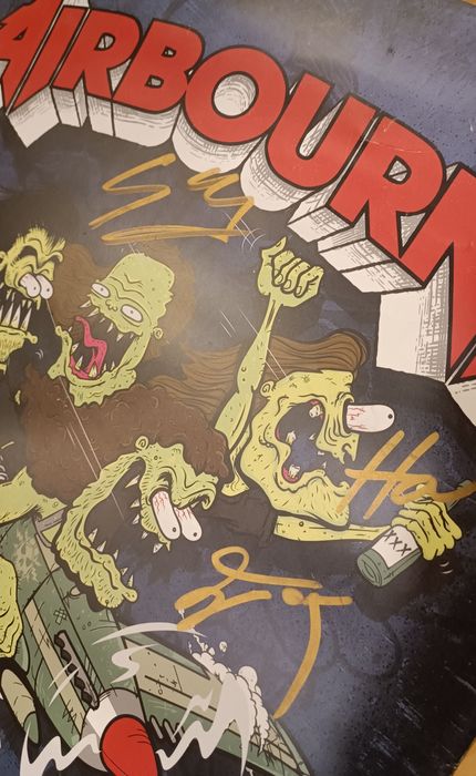 Plakat Airbourne z podpisami całego zespołu