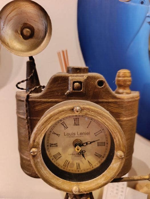 Máquina fotográfica relogio