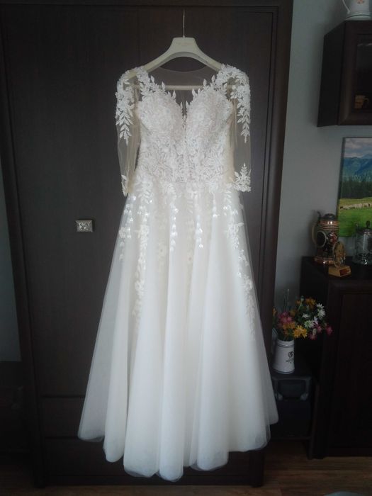 Sprzedam nową suknię ślubną litera A