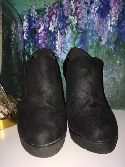 Botas pretas salto alto