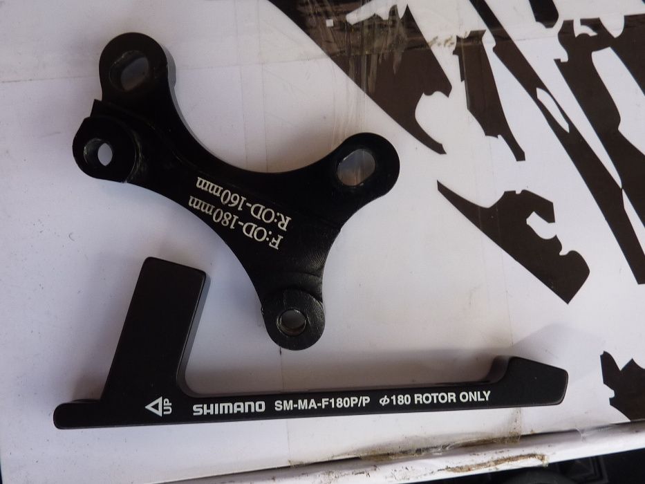 material de Btt (selim, roda traseira 29, guiador carbono, adaptadores