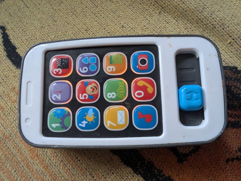 Fisher Price telefon SMARTFONIK MALUCHA po polsku
Fisher Prl SMARTFO