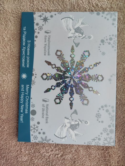 Продам монети: жетон до новорічних свят 2022 і Сідней,