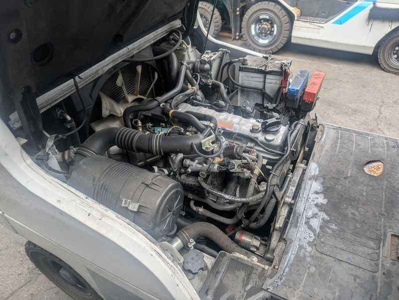 Вилочний автонавантажувач Nissan, 2012 року.
Модель: P1F1A15D.