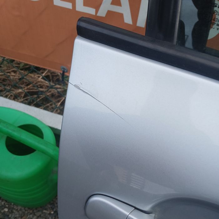 Drzwi prawe prawy przód przednie Leon II ls7y