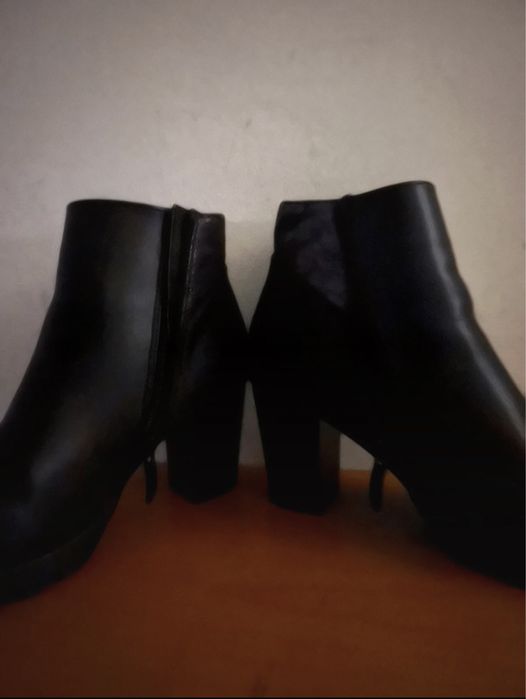 Botas da natura com salto