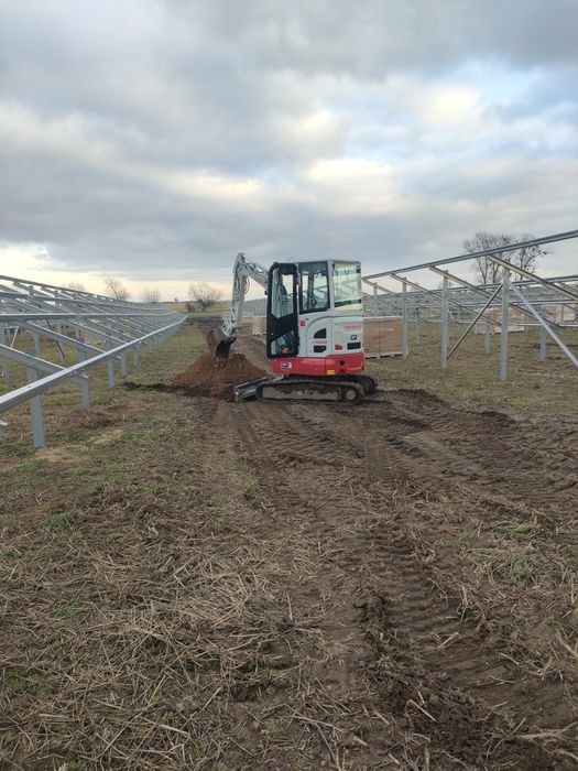 Roboty ziemne koparko-ładowarką minikoparka wyburzenia rozbiórki