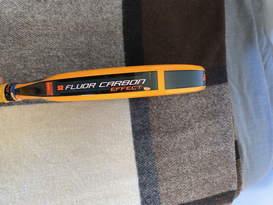 Raquete de padel da starvie laranja e preta