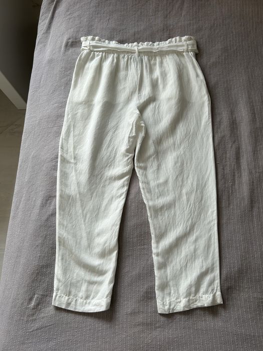Białe lniane długie spodnie z wysokim stanem C&A 42