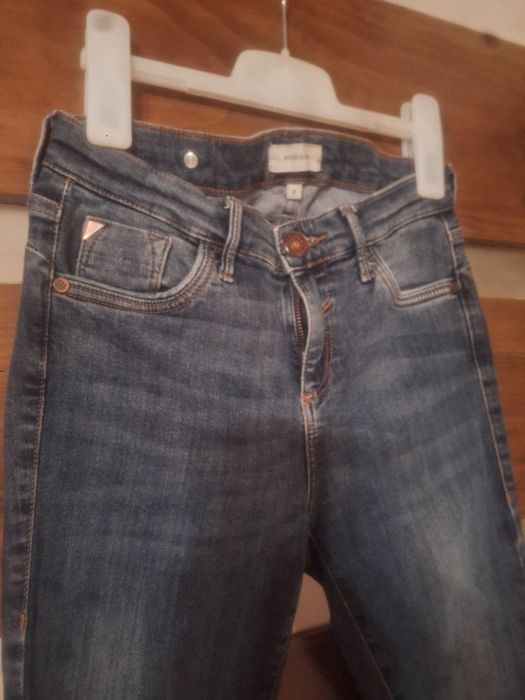 Spodnie damskie River Island rozm.8 stan bardzo dobry.
