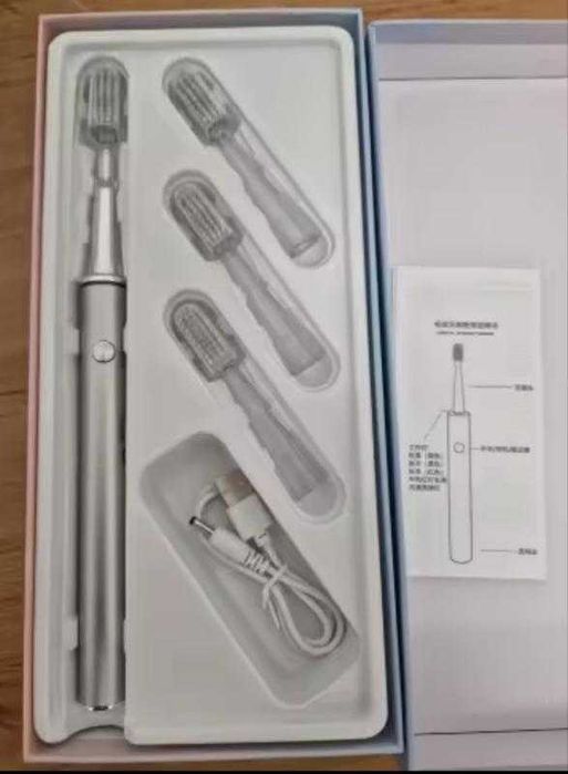 Електрична зубна щітка з USB зарядкою та 4 додатковими насадками .
