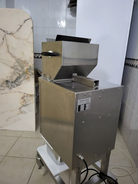 Máquina de desfiar carne.