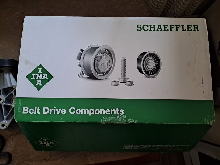 Комплект натягувач ременя з роликом і ремінь